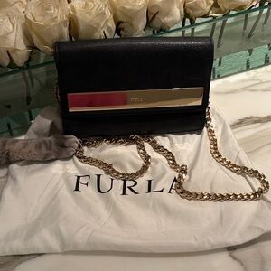 Furla Black Clutch with Gold Chain Accent